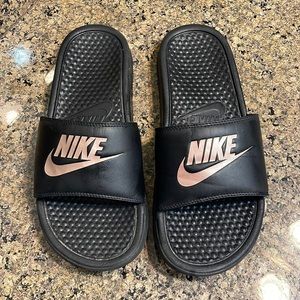 Woman’s Nike slides
